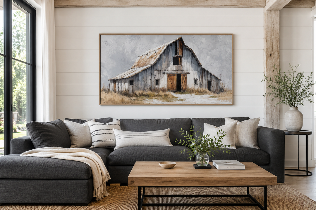 Old Grey Barn Close Up rustic canvas wall art above a dark grey sofa in a farmhouse living room.