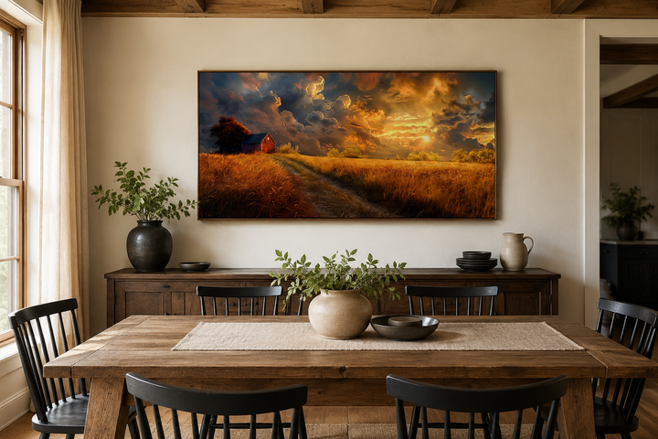 Old red barn in autumn sunset framed farmhouse canvas wall art hanging above a dining table.