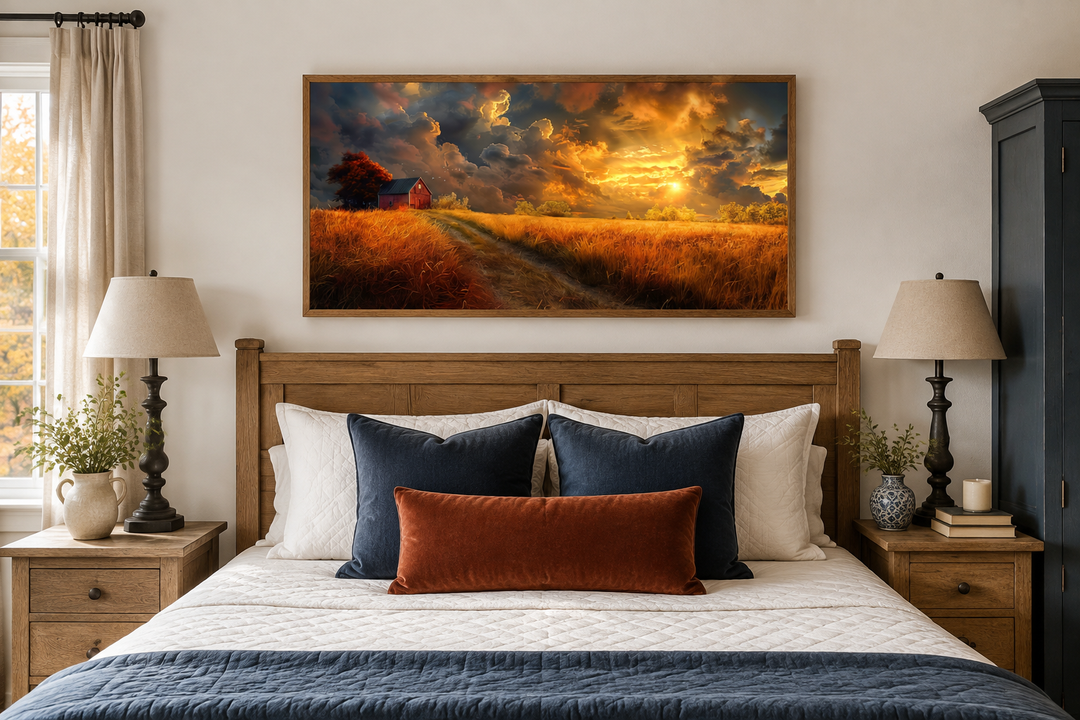Old red barn in autumn sunset framed farmhouse canvas wall art hanging above a wooden bed frame.