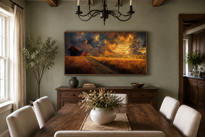 Old red barn in autumn sunset framed farmhouse canvas wall art hanging in a rustic dining room.
