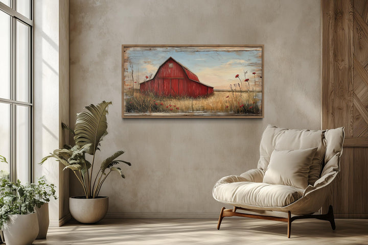 Old red barn on weathered wood canvas wall art hanging in a rustic farmhouse living room.