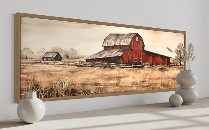 Horizontal framed canvas art of a rustic red barn in a field.