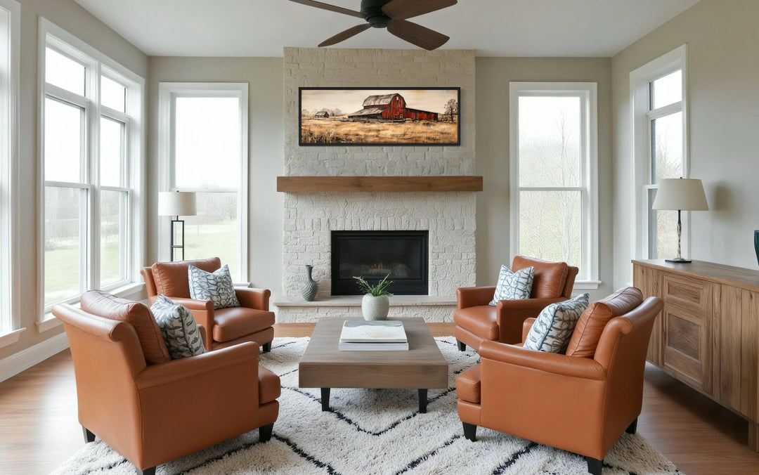 Horizontal framed canvas painting of a rustic red barn in a field.