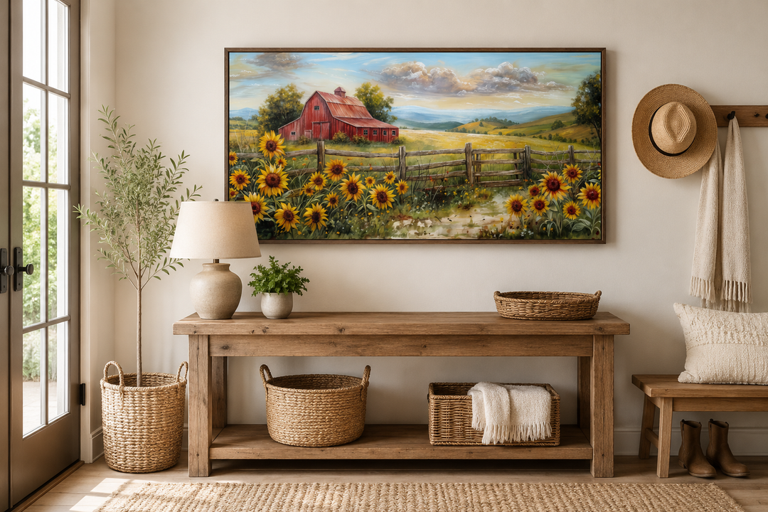 Panoramic rustic wall art featuring a red barn and sunflower field above a wooden console table.