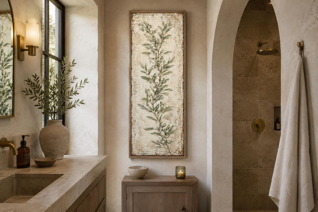 Tall vertical canvas wall art featuring a painted olive branch in a rustic bathroom setting.