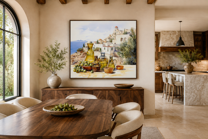 Framed watercolor canvas art of a Greek landscape with olives and oil bottles in a dining room.