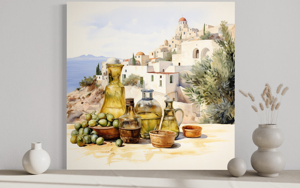 Watercolor canvas wall art of olives, oil bottles, and a Greek village landscape for kitchen decor.