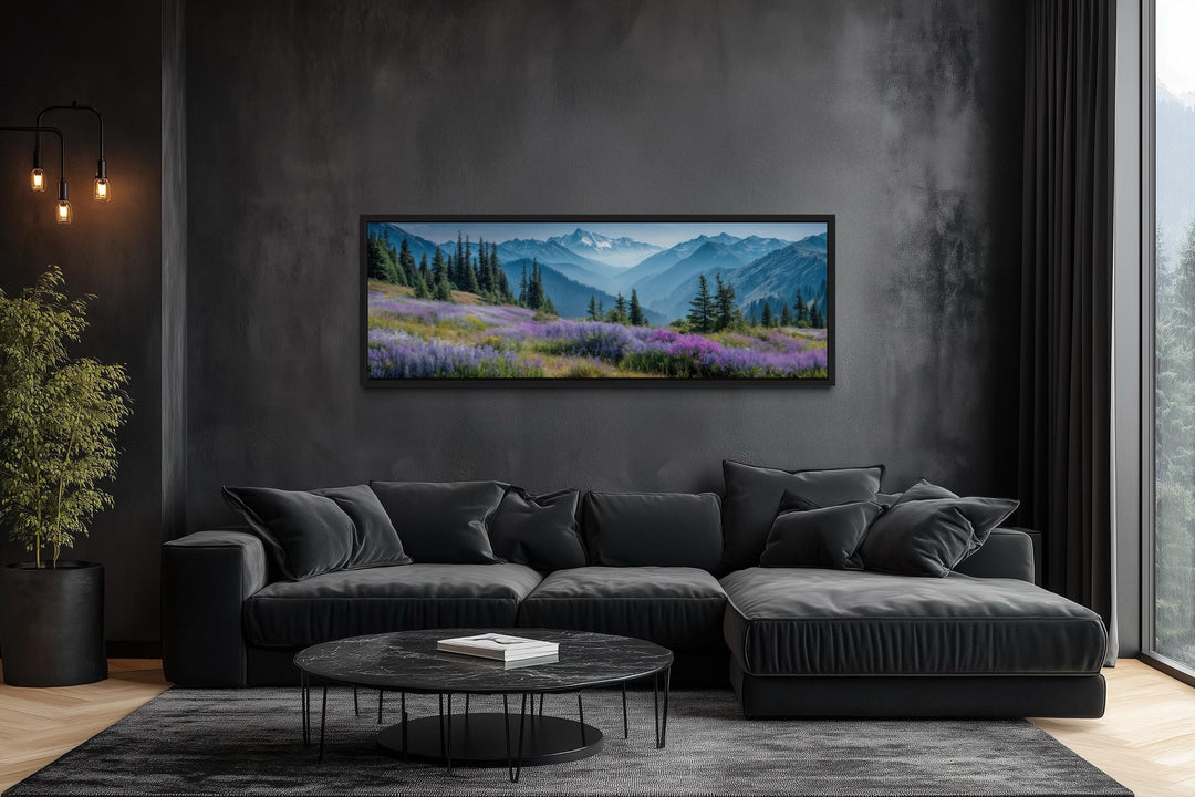 Olympic National Park panoramic canvas wall art above a black sofa in a modern dark living room.