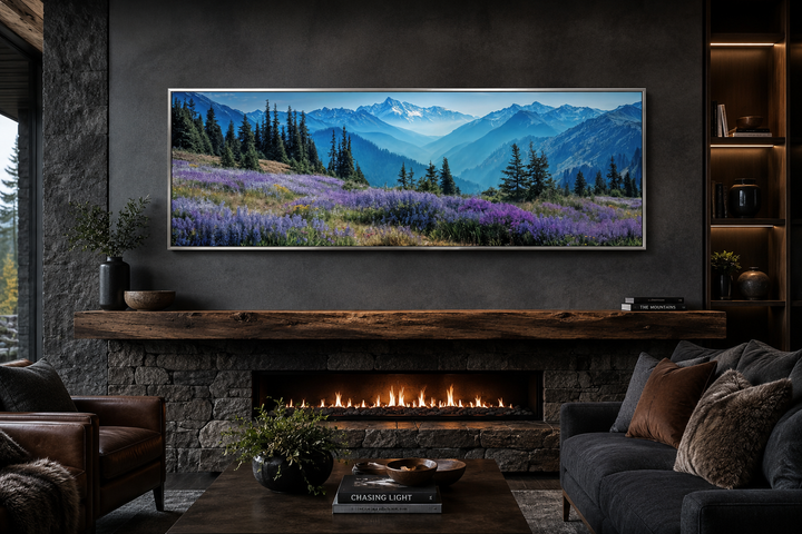 Panoramic canvas wall art of Olympic National Park wildflowers and mountains over a fireplace.