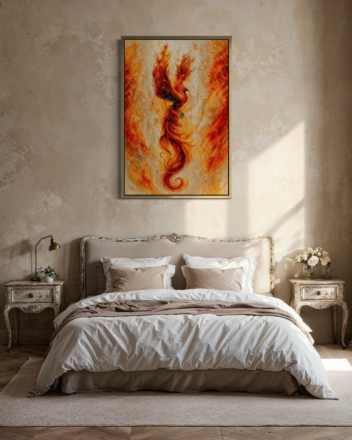 Vertical canvas wall art of a fiery orange and gold phoenix hanging above a neutral-toned bed.