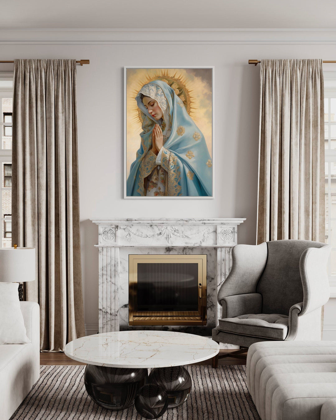 Our Lady of Guadalupe framed canvas wall art hanging above a marble fireplace in a living room.