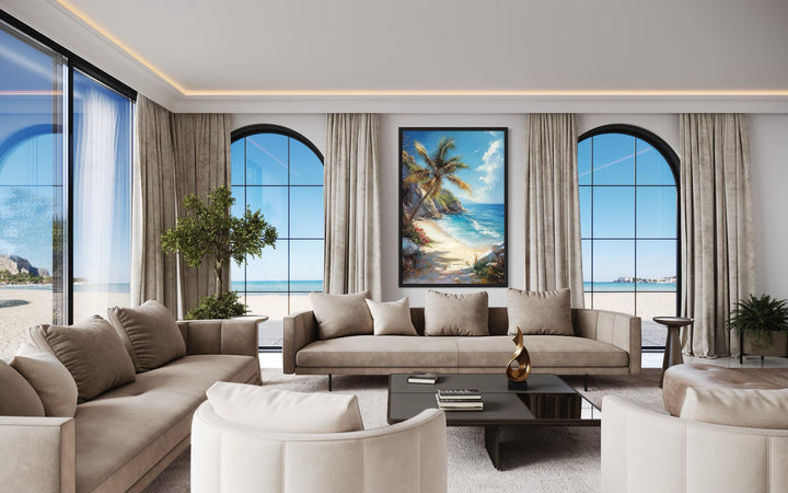 Palm tree with ocean view and tropical beach framed canvas wall art in a modern living room.