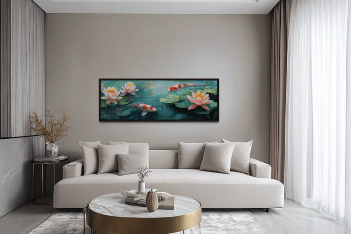 Panoramic framed canvas wall art of koi fish and water lilies in a modern living room setting.