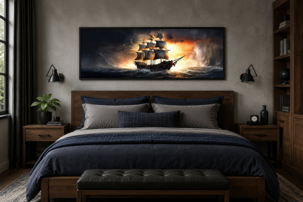 Panoramic framed canvas wall art of a pirate ship in a stormy ocean above a bed in a men's bedroom.