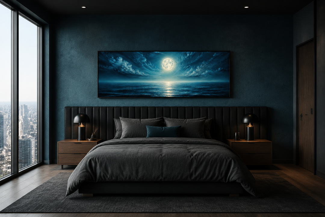 Panoramic navy blue ocean and moon wall art above a dark bed in a modern bedroom.