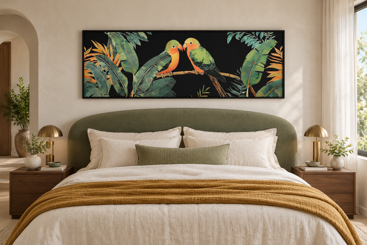 Lovebirds in tropical rainforest long horizontal framed canvas wall art above a bed.