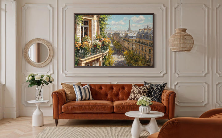 A framed canvas painting of a sunlit Parisian balcony view with the Eiffel Tower in the distance.