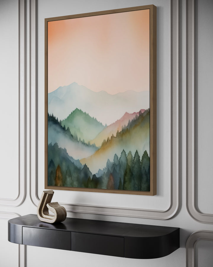 Vertical framed canvas wall art featuring a pastel mountain landscape in blush pink and green.