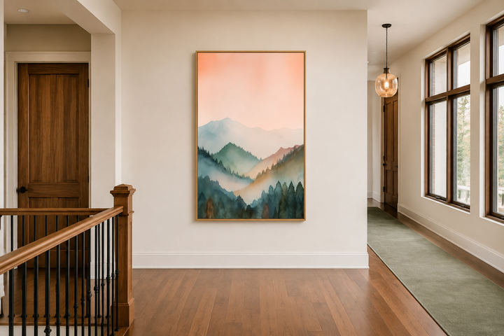 Vertical framed canvas wall art of a pastel mountain landscape in blush pink and green.