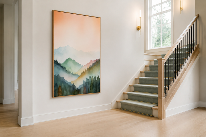 Vertical framed canvas wall art of a pastel mountain landscape in blush pink and green.