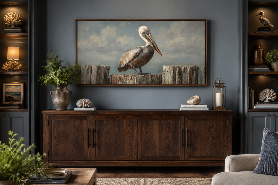 Pelican Standing On Wooden Posts Coastal Canvas Wall Art above a dark wood sideboard.
