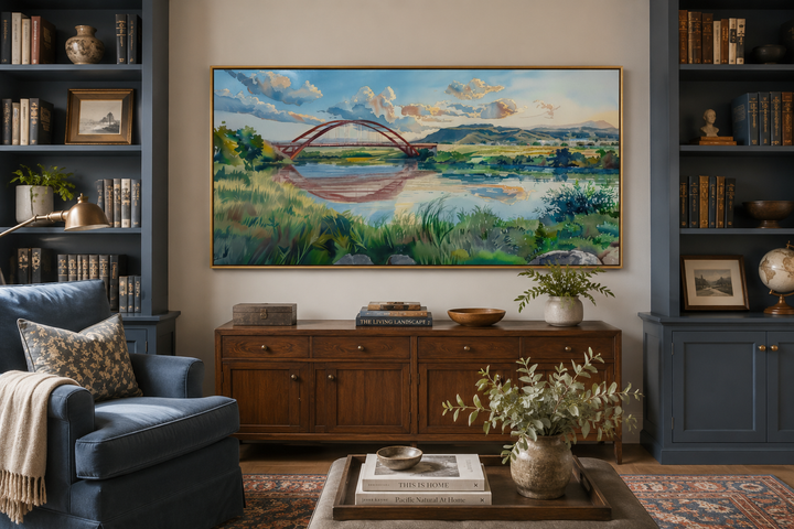 Pennybacker Bridge watercolor painting wall art in a gold frame above a wooden sideboard.