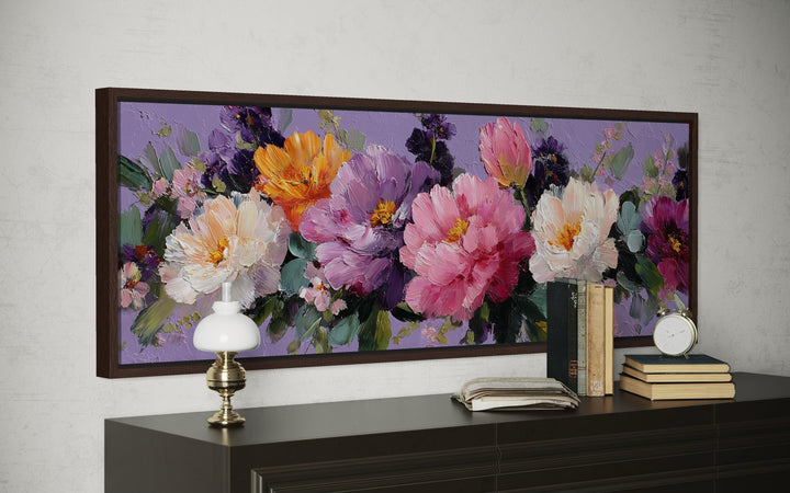 Horizontal canvas wall art featuring a textured oil painting of colorful peonies on a purple background.
