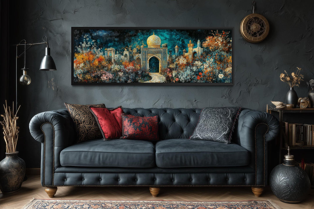 Panoramic Persian Teal Gold canvas art of a floral palace garden above a dark tufted sofa.