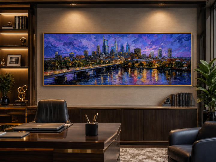 Philadelphia skyline wall art in a floating frame above a desk in a modern office.