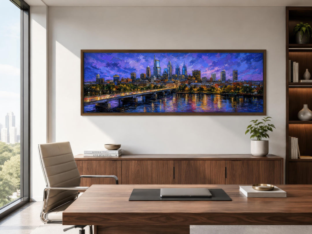 Philadelphia skyline wall art in a long horizontal canvas with a floating frame in a modern office.