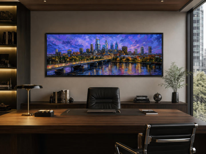Philadelphia skyline wall art canvas with floating frame in a modern office above a wooden desk.