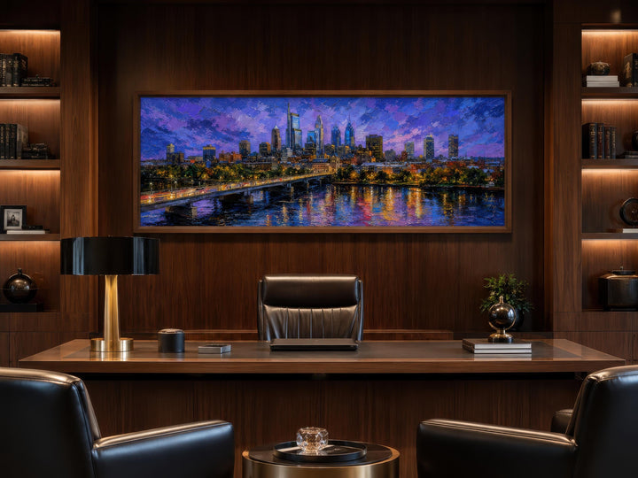 Philadelphia skyline wall art on a long horizontal canvas with a floating frame in a home office.