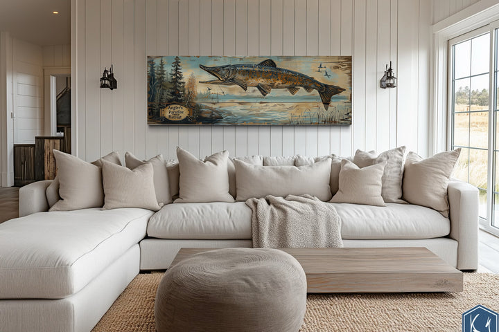 Pike Fish Wall Art - Angler's Paradise Retreat Fishing Sign over a white sectional sofa in a cabin.