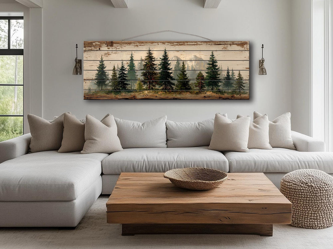 Pine forest mountain landscape printed on a long horizontal rustic wood wall art piece.