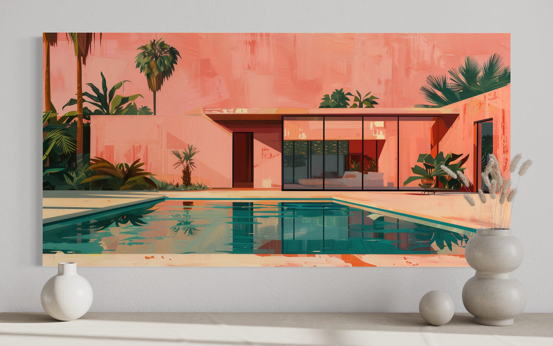 Retro mid-century modern house and pool canvas print in pink and green, displayed on a white wall.