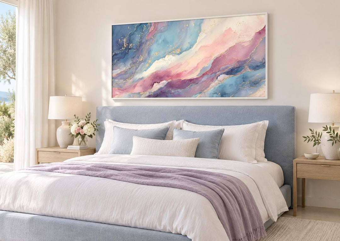 Pink and blue pastel abstract marble framed canvas wall art above a bed in a modern bedroom.