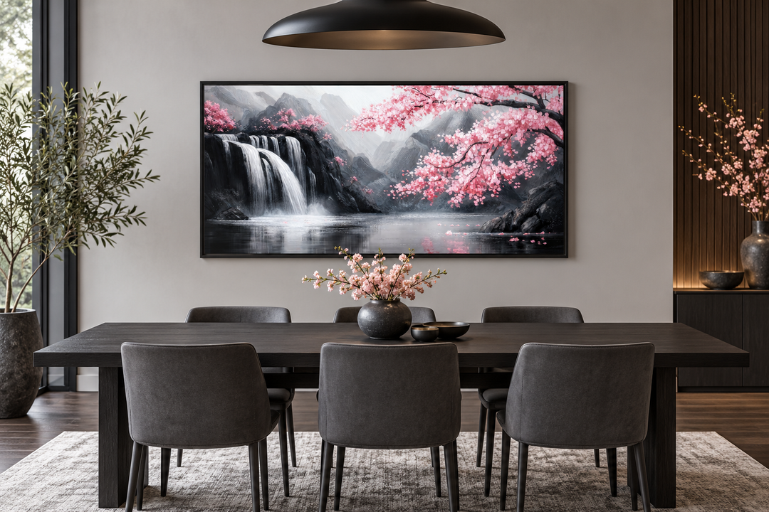 Pink cherry blossom and grey waterfall framed canvas wall art in a modern dining room.