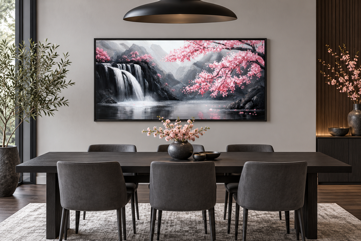 Pink cherry blossom and grey waterfall framed canvas wall art in a modern dining room.