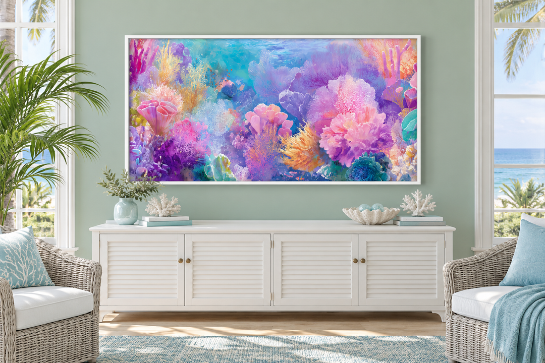Panoramic coral reef wall art in pink, teal, and purple above a white sideboard in a coastal room.