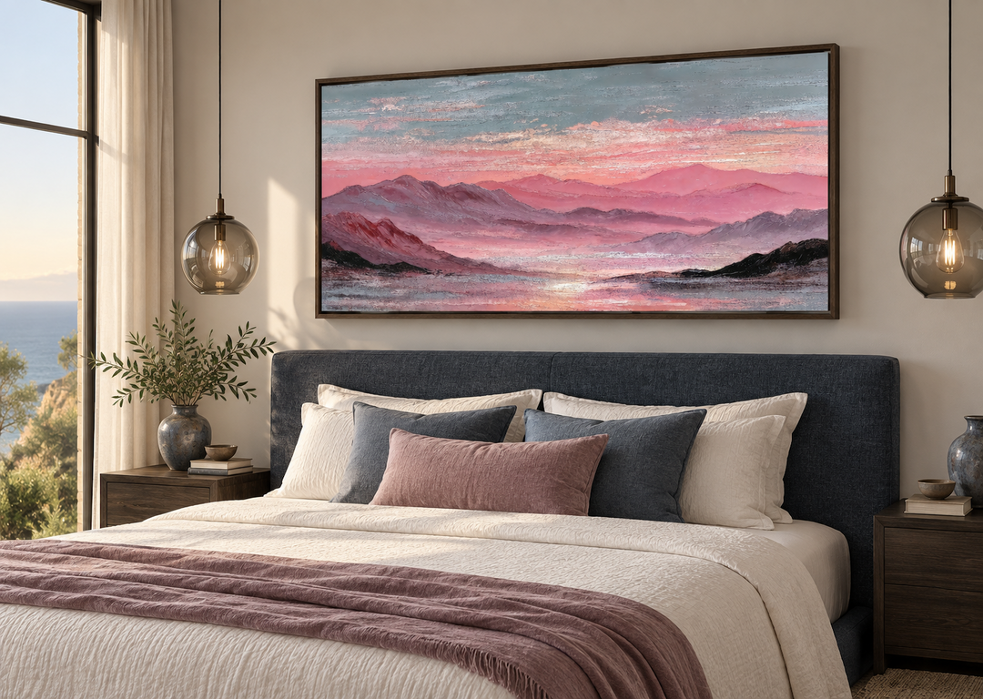 Pink mountain landscape canvas wall art hanging above a bed in a modern, serene bedroom.