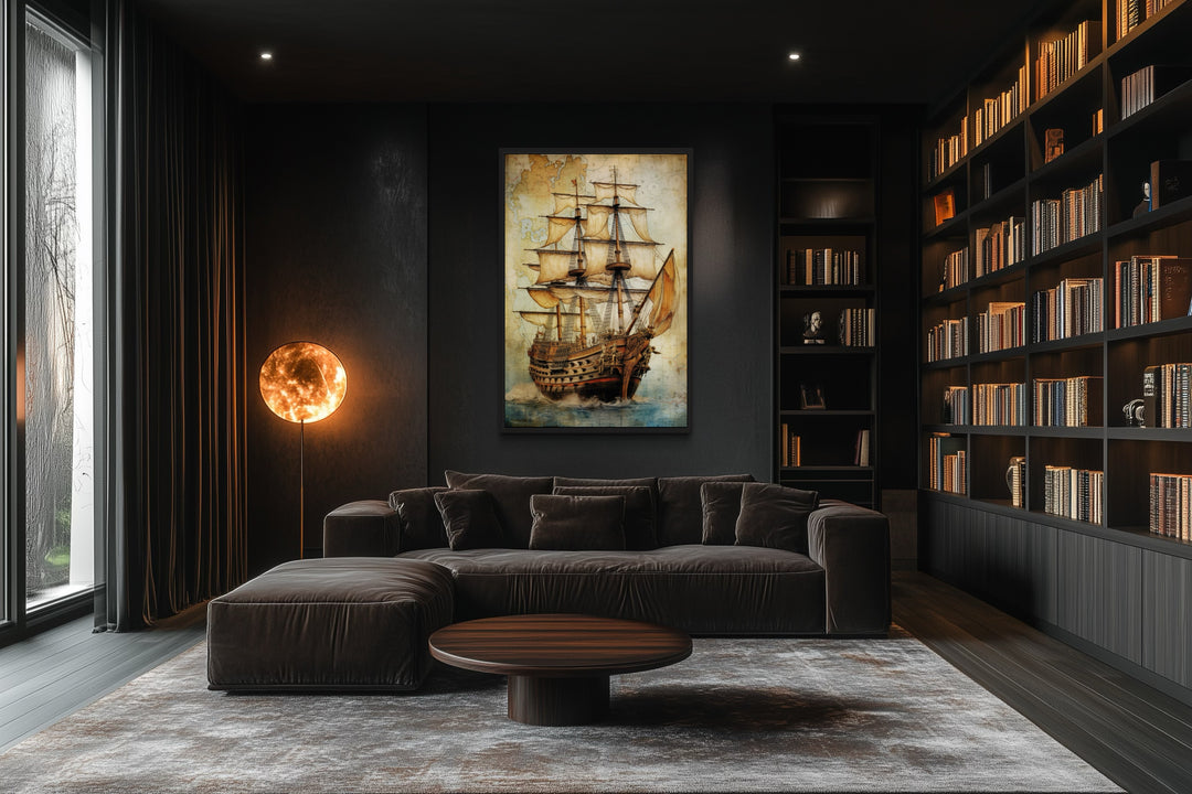 Framed canvas wall art of a pirate ship on an antique treasure map in a dark, modern living room.