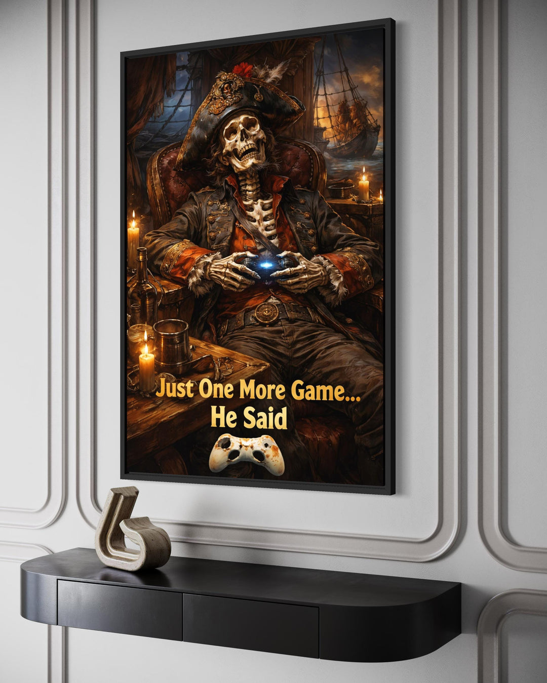 Framed canvas art of a pirate skeleton gaming with the quote Just One More Game... He Said.