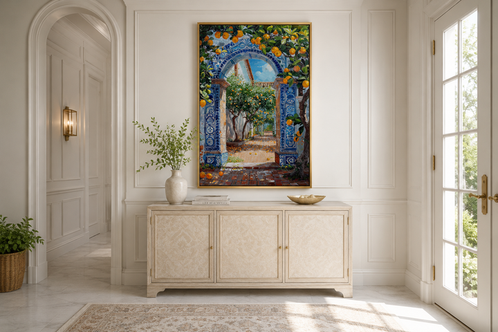 Portuguese doorway wall art with blue azulejos and orange trees above a beige sideboard.