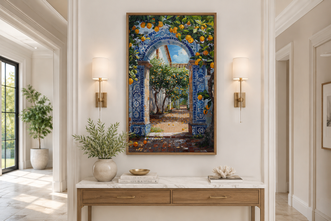 Framed wall art of a Portuguese doorway with blue azulejos tiles and vibrant orange trees.