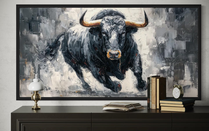 Powerful charging black bull canvas wall art with textured brushstrokes for men's office decor.