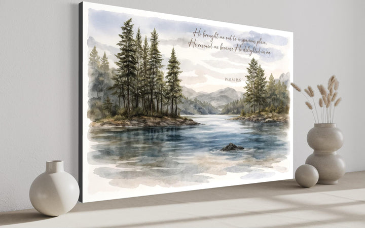 Watercolor lake landscape canvas print with Psalm 18:19 scripture and evergreen trees.