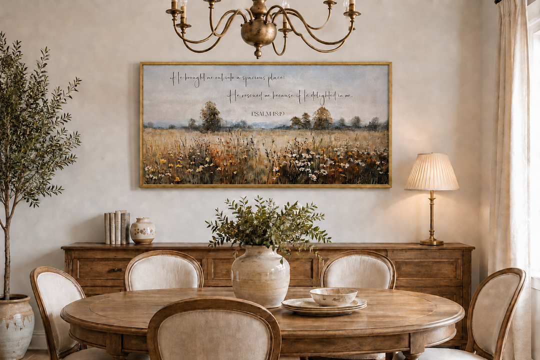 Psalm 18:19 scripture wall art featuring a wildflower field landscape in a gold frame.