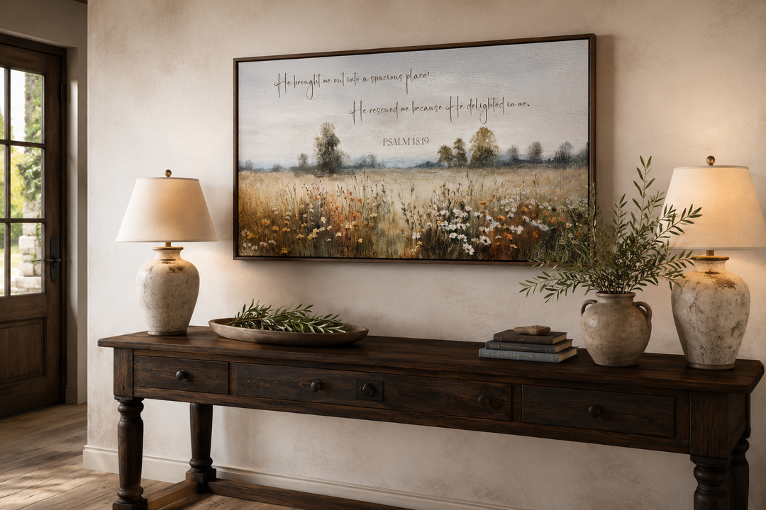 Psalm 18:19 scripture wall art featuring a wildflower field landscape in a dark wood frame.