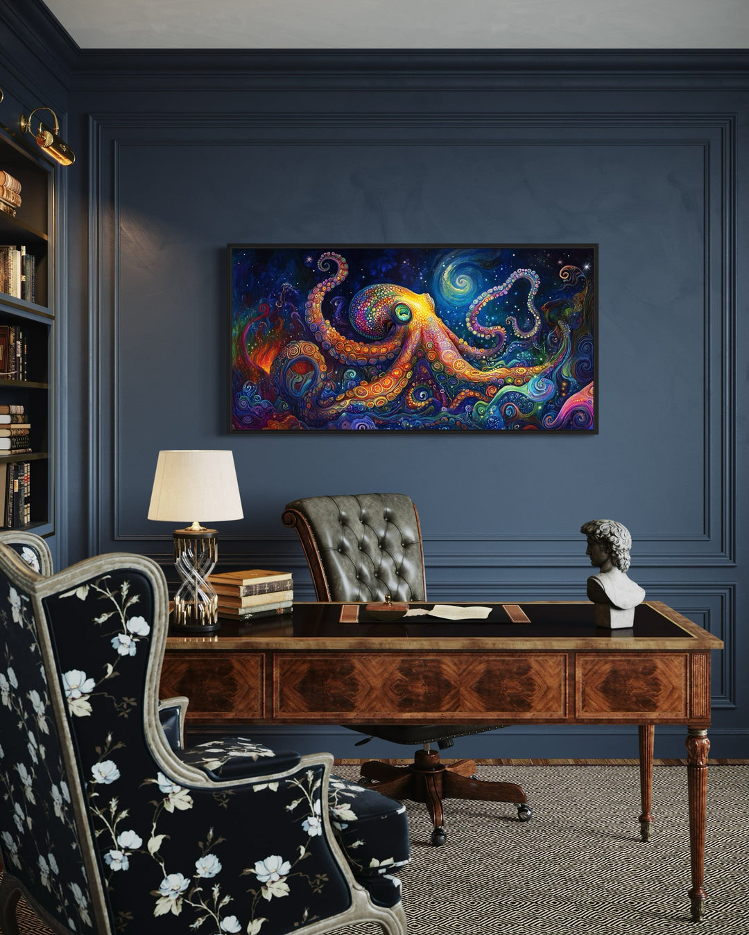 Psychedelic octopus framed canvas wall art hanging above a wooden desk in a dark blue office.