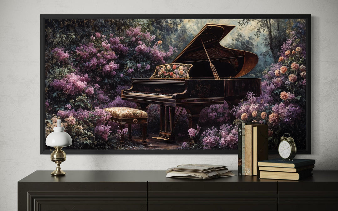 A framed canvas print of a grand piano surrounded by lush purple flowers above a dark console table.